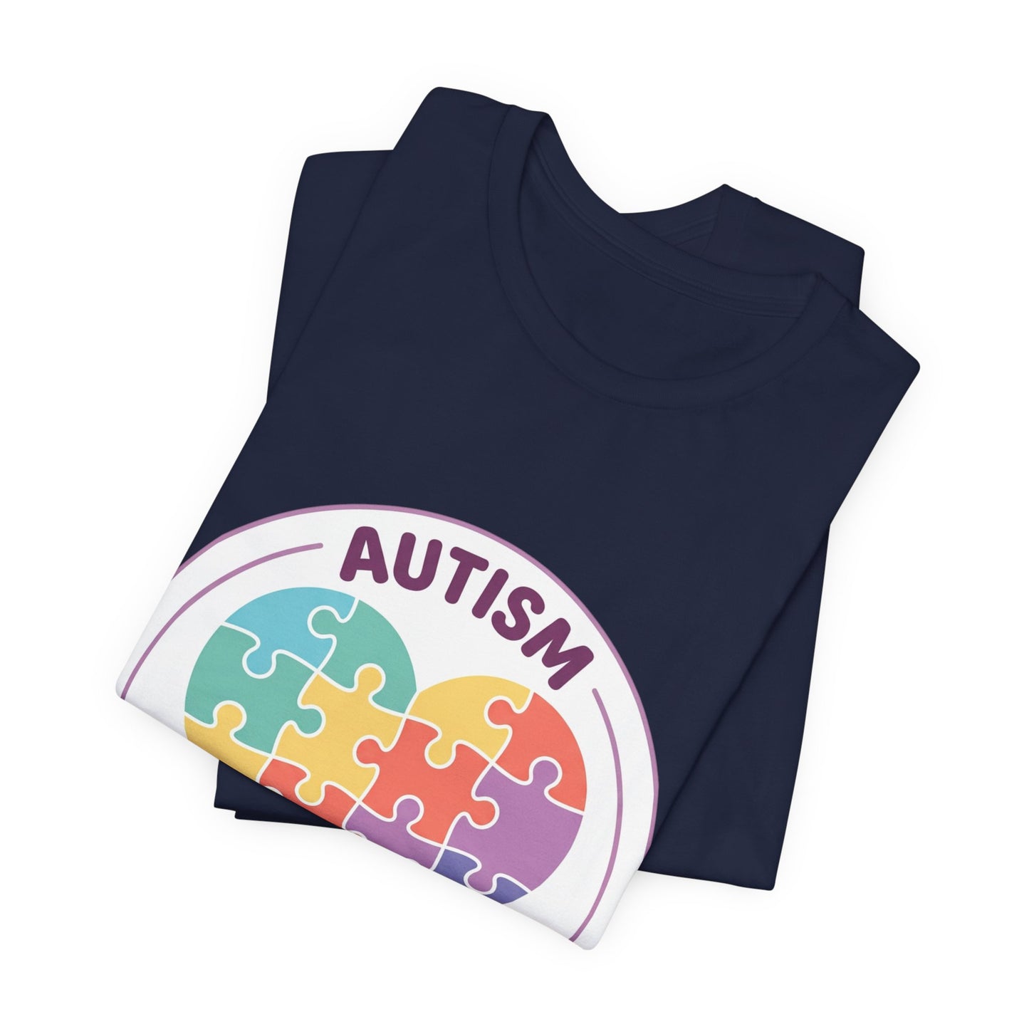 t-shirt with a colorful heart puzzle design and 'Autism Different Not Less' text on a white background