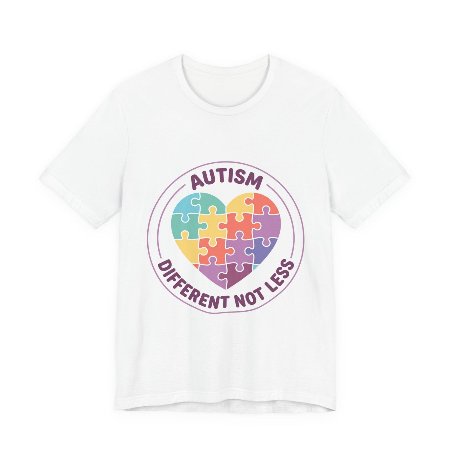t-shirt with a colorful heart puzzle design and 'Autism Different Not Less' text on a white background