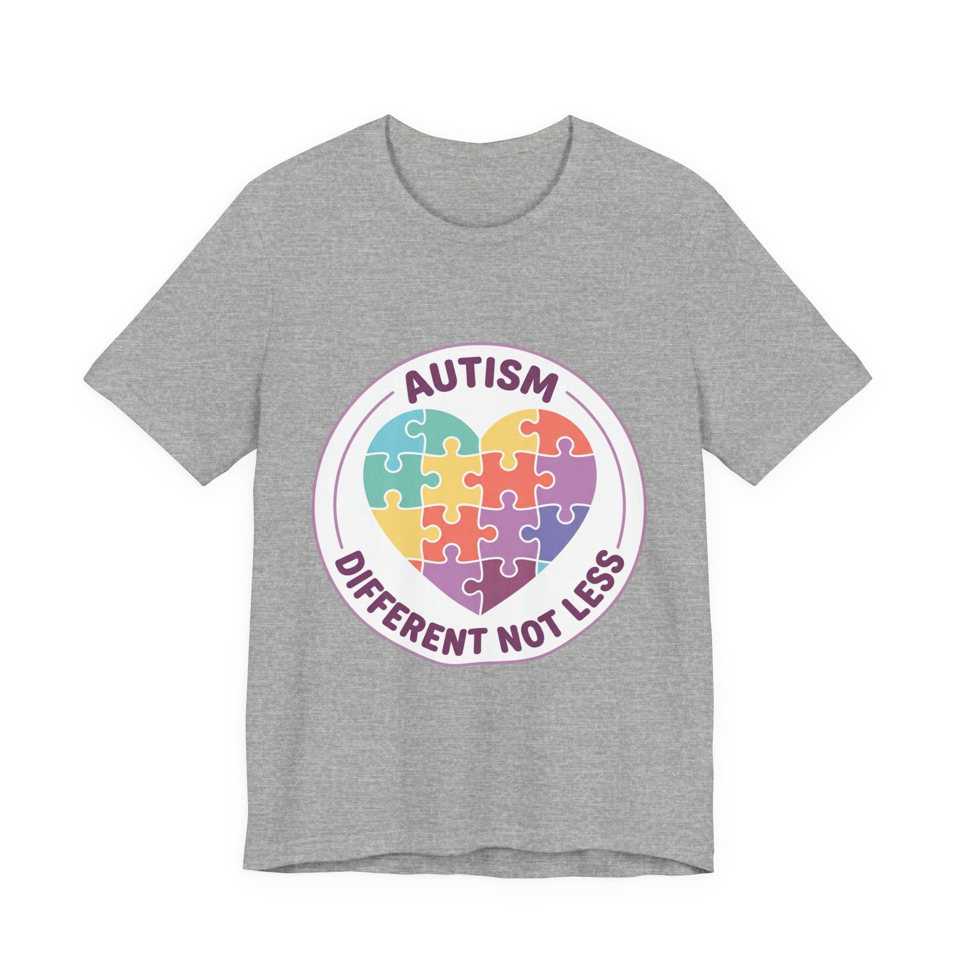 t-shirt with a colorful heart puzzle design and 'Autism Different Not Less' text on a white background