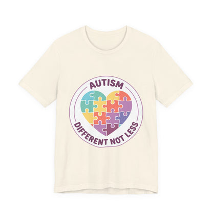 t-shirt with a colorful heart puzzle design and 'Autism Different Not Less' text on a white background