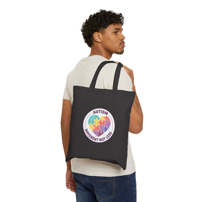 Person holding a tote bag with an autism awareness design in a casual setting.