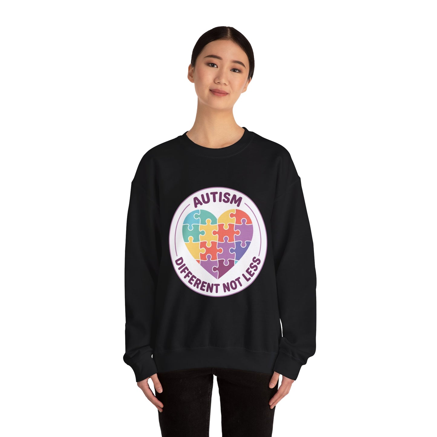 Sweatshirt with autism awareness design featuring a heart made of puzzle pieces on a white background